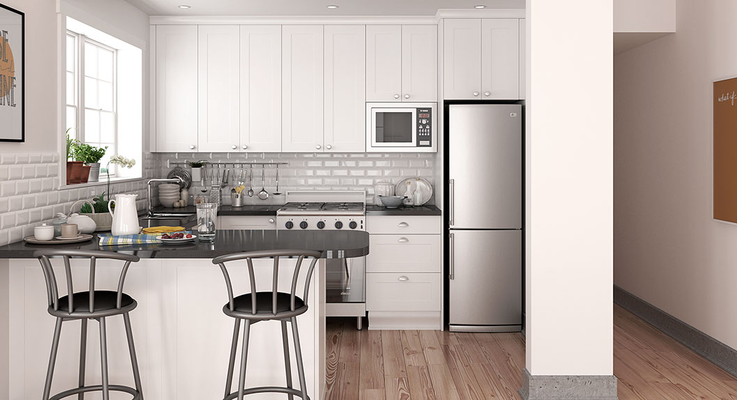 small white U-shaped kitchen cabinets
