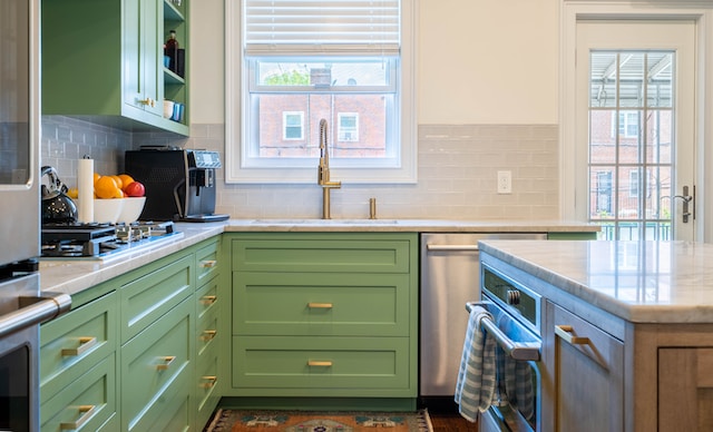 green shaker kitchen cabinets with brass hardware