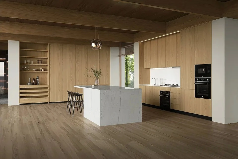 modern custom light wood thermofoil cabinets with white countertop